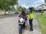 FOTO 12 - BANTU KLIK HELM