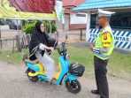 FOTO 5 - TEGUR PENGENDARA SEPEDA LISTRIK